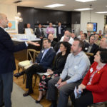 mike robbins speaks to crowd at hughes marino4 1