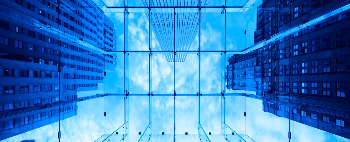 looking up at skyscrapers
