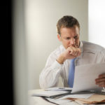 businessman reviewing document