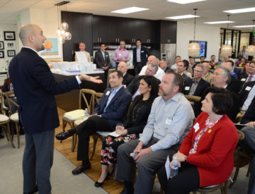 mike robbins speaks to crowd at hughes marino4 1