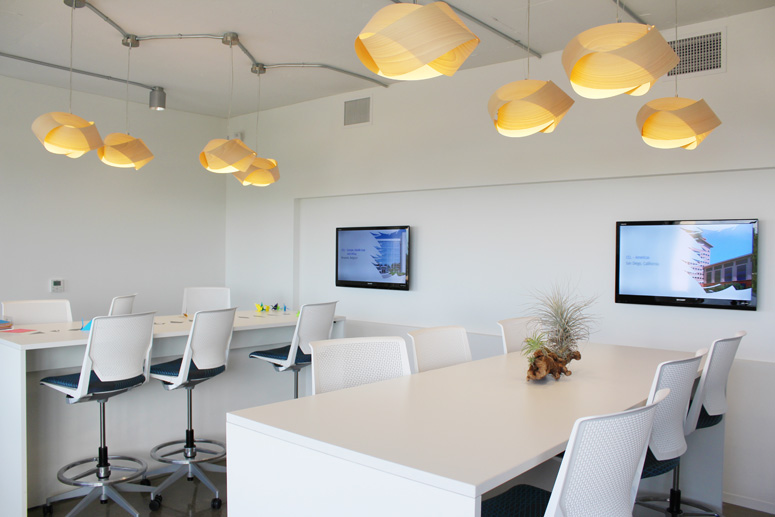 Bar top seating and a paper crane folding station create the perfect setting for serendipitous meetings.