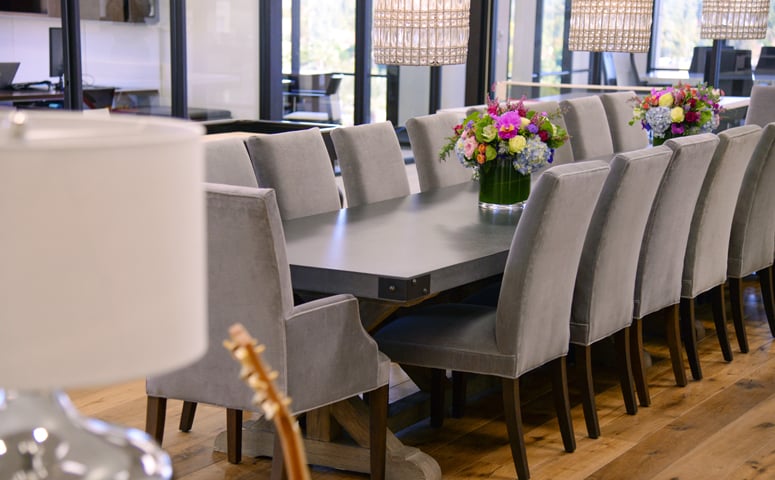 Each of our offices features a large farm table – perfect for our team to enjoy lunch together as a family!]