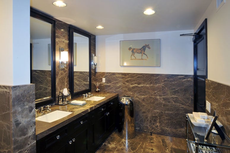 Marble lined bathrooms in Hughes Marino's San Diego office