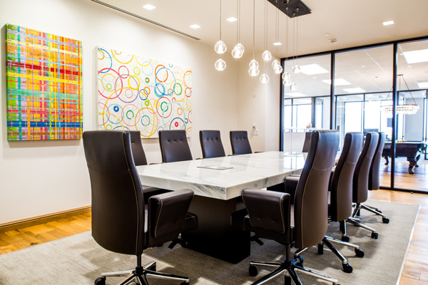 The Hughes Marino conference room includes a table by Montbleau.