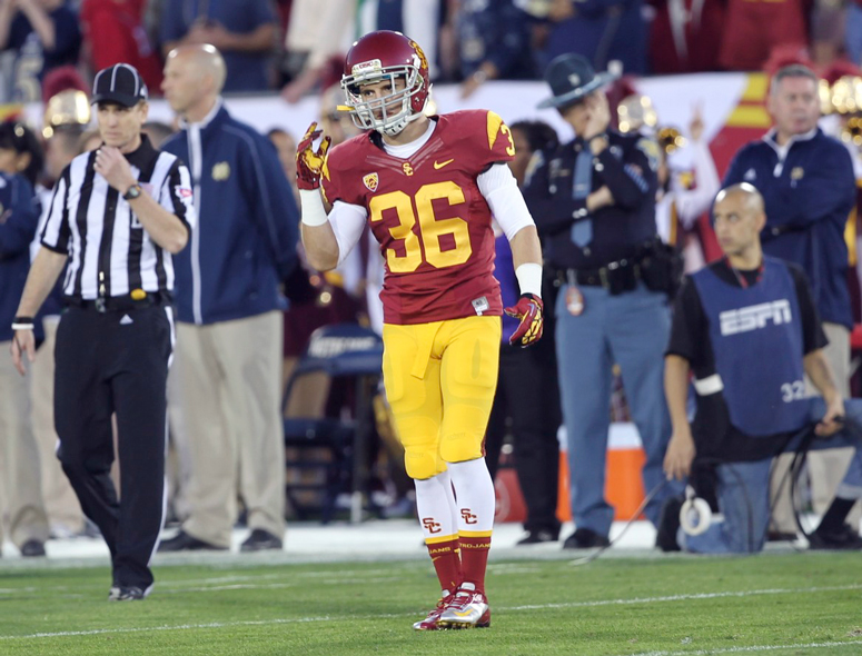 Champion of the Underdog: Overcoming Adversity Between Hash Marks and Business Parks